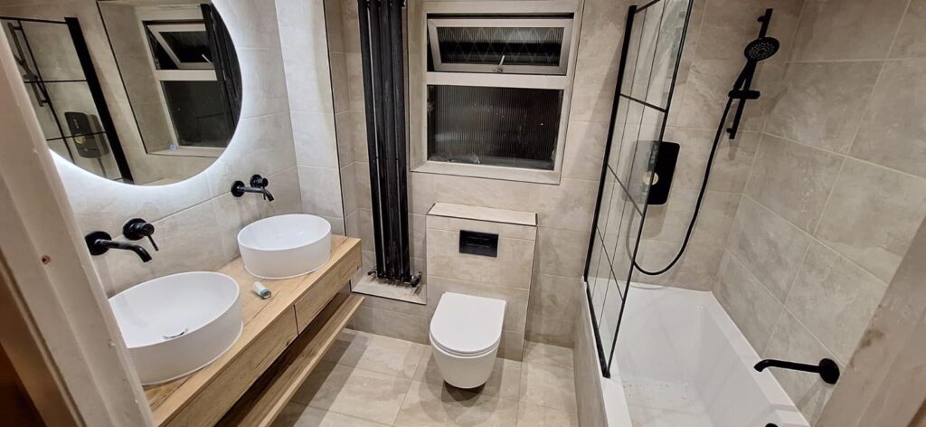 Skilled local plumber performing general plumbing maintenance and tap repairs in Manchester